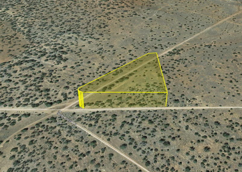 Stunning Corner lot in Seligman on 2.77 acres of Juniper Trees